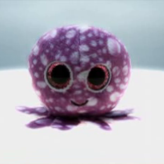 A tiny plushy squid with huge eyes
